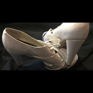 White shiny leather heels